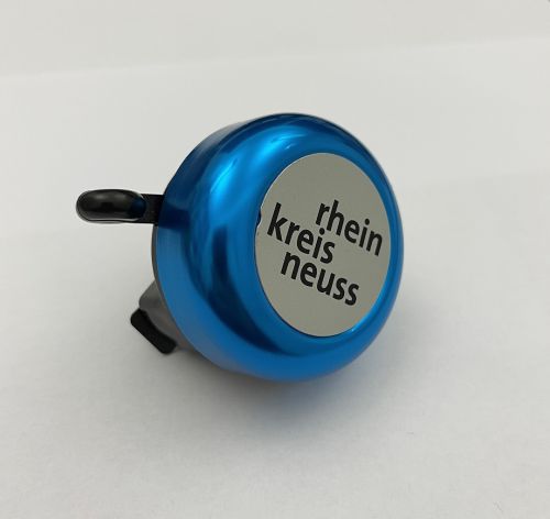 Eine Fahrradklingel mit dem Schriftzug "Rhein-Kreis Neuss"
